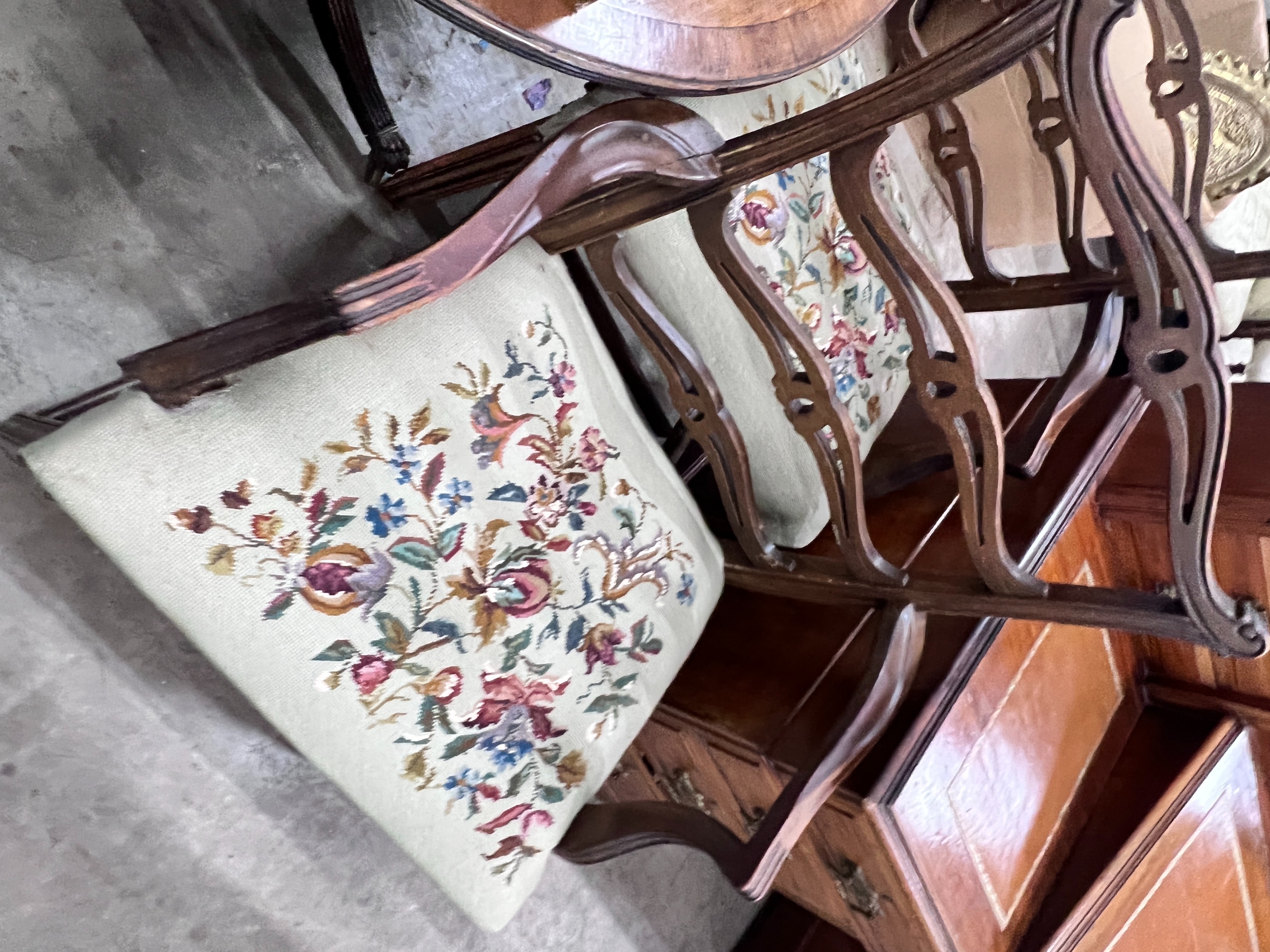 A 19th century and later D end extending dining table 176cm extended 1 spare leaf and six George III style pierced ladderback chairs, 2 with arms.